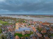 Hoogwater in Woudrichem van VVV Biesboschlinie