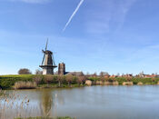 Molen 'Nooit Gedagt' en Martinustoren van VVV Biesboschlinie