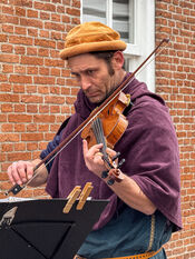Muzikant - Middeleeuwse Streekmarkt Woudrichem van VVV Biesboschlinie